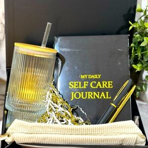 Custom Black& gold self care gift box. Ribbed cup, pen pouch, journal.